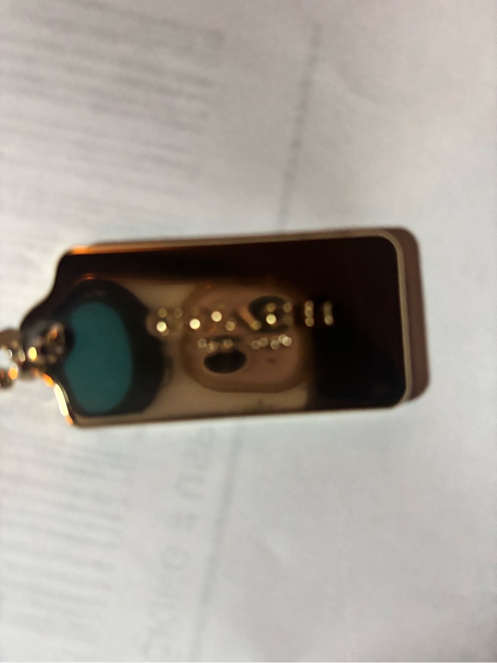 Coach Gold Tone heave coach tag